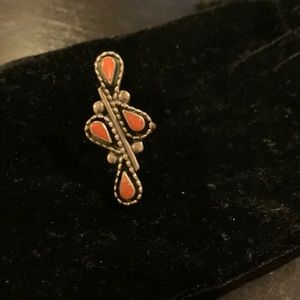 Silver ring with coral color stone